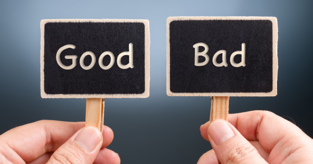 Hands holding signs that say Good and Bad
