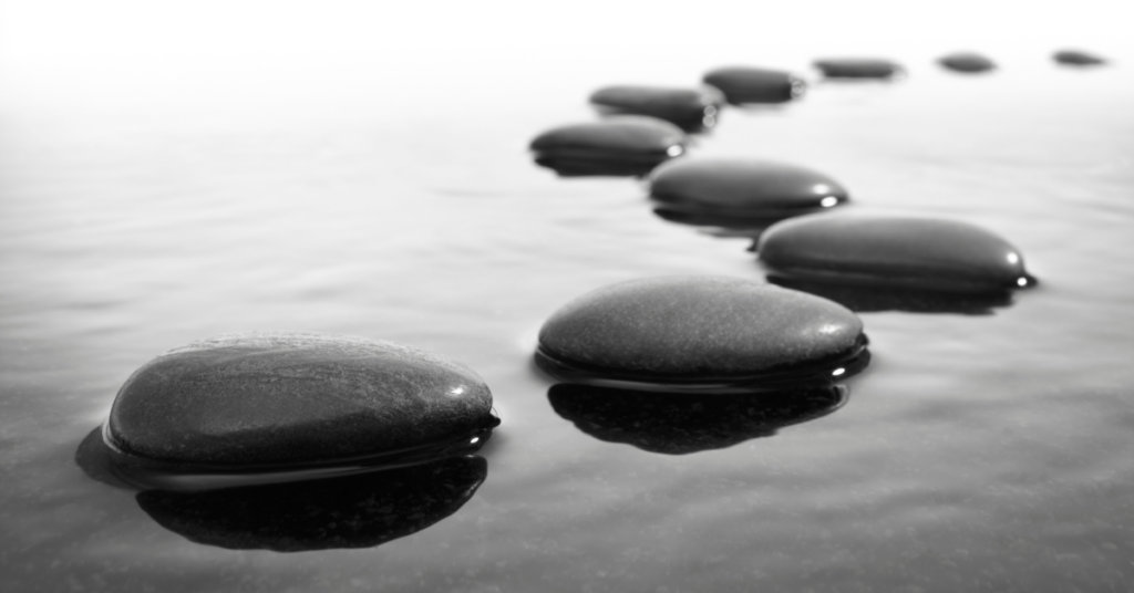 Stepping stones in water. 6 steps to start your organization-wide analytics training