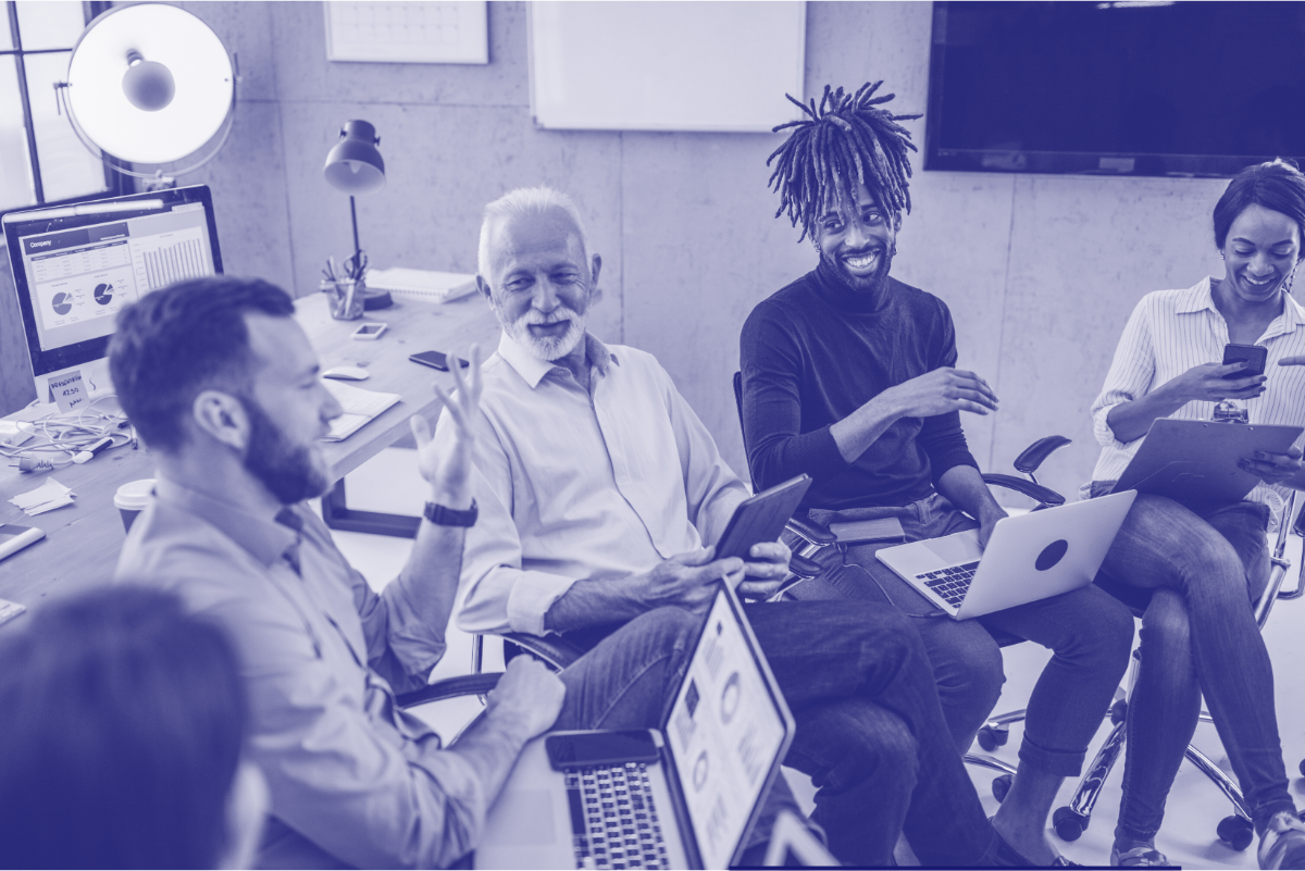 Analytics Coach working with happy team